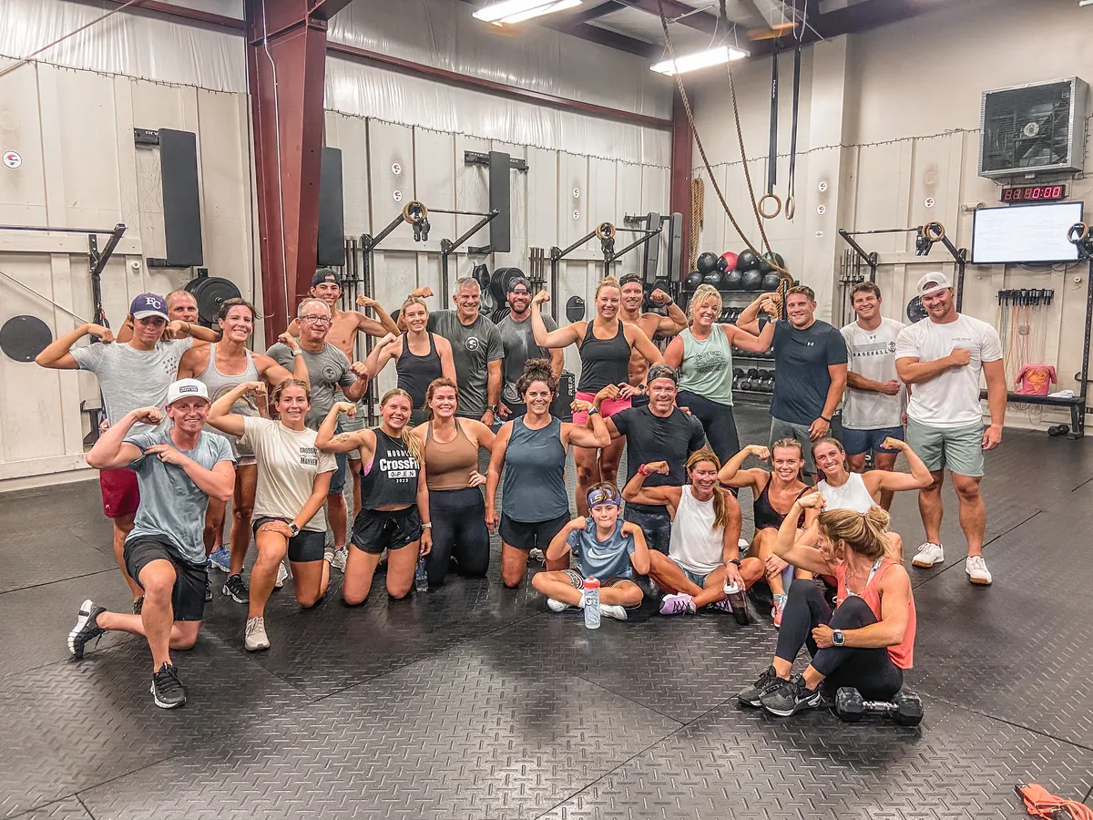 The whole class flexing together after the workout